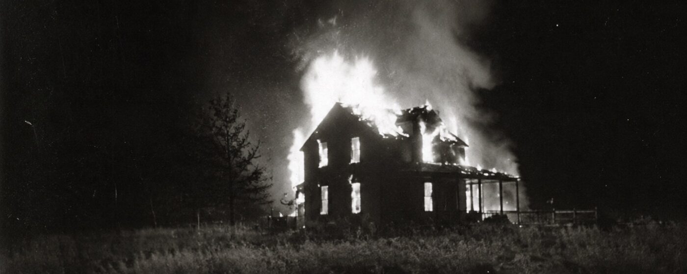 Plate 4 — Structure fire, rural field, night