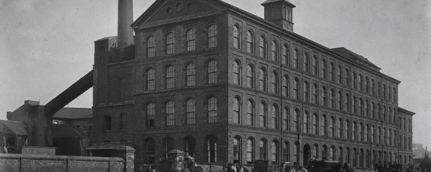 Plate 54 — Brick factory exterior, daytime, horse carts