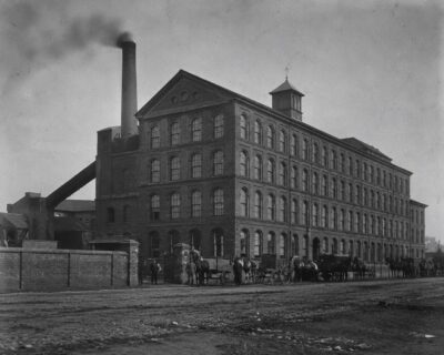 Plate 54 — Brick factory exterior, daytime, horse carts