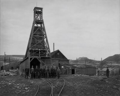 Plate 101 — Mine headframe and crew, Western Expansion District
